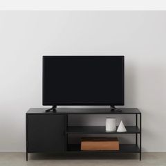Black metal TV stand