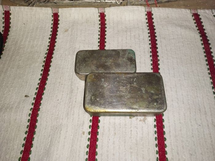 Vintage fly fishing tins