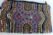 New beaded clutch bag tag attached