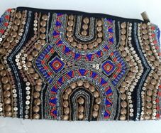 New beaded clutch bag tag attached
