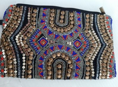 New beaded clutch bag tag attached