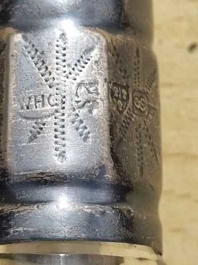 Vintage crystal bottle with silver top
