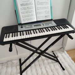 Yamaha YPT 255 , electronic keyboard in perfect condition, comes with a brand new stand
