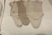 3 newborn body suits