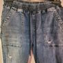 distressed denim jeans Image 4