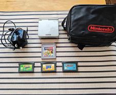 Nintendo Gameboy Advance SP With 4 games - Charger and Carry Case