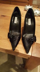 Black glitter shoes with satin bow
