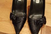 Black glitter shoes with satin bow