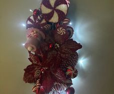 Christmas candy cane swag handmade with unique pieces beautiful display for wall table or door 75 cm in length