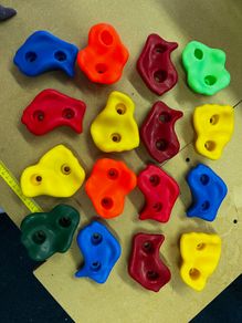 Climbing wall grips