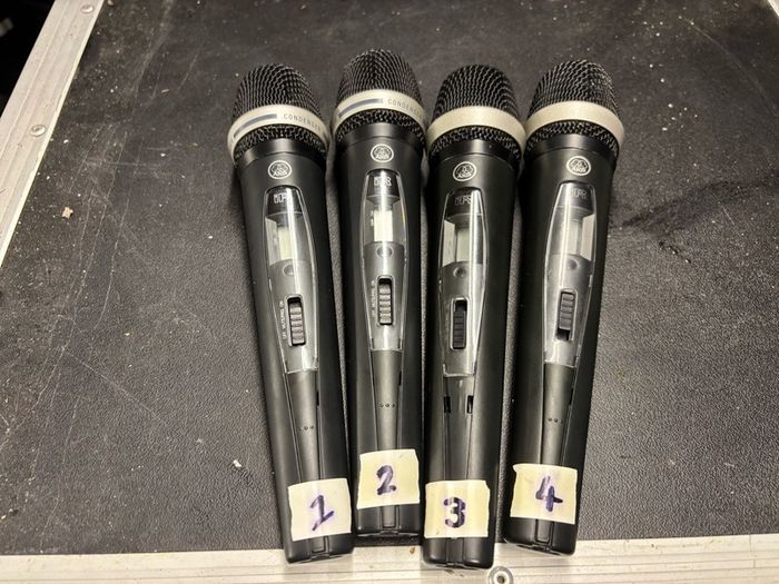AKG radio microphone system:  4 x AKG HT 470 D Band 10 microphones with 4 x AKG SR470