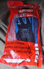 a selection of new in the bag work gloves