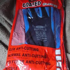 a selection of new in the bag work gloves