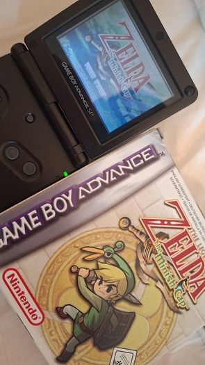 Gameboy Advance SP Boxed  , with two games.