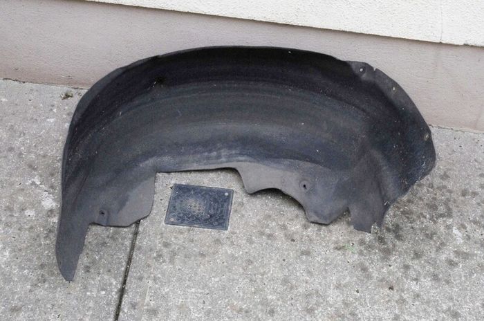 BMW  F11 (5 series) wheel arch cover.