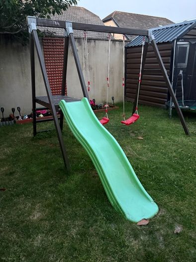 Double swing set with slide.