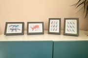 four framed pictures