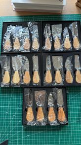 5 sets of boxed cheese knives