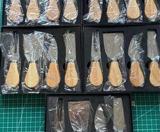 5 sets of boxed cheese knives