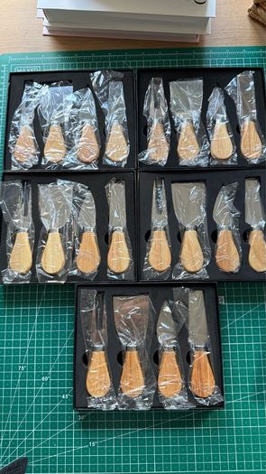 5 sets of boxed cheese knives