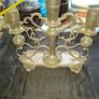 Antique Late 19th early 20th century three light candelabra, with scalloped candle nozzles, scrolling foliate branches and an oval base with chased decoration Image 3
