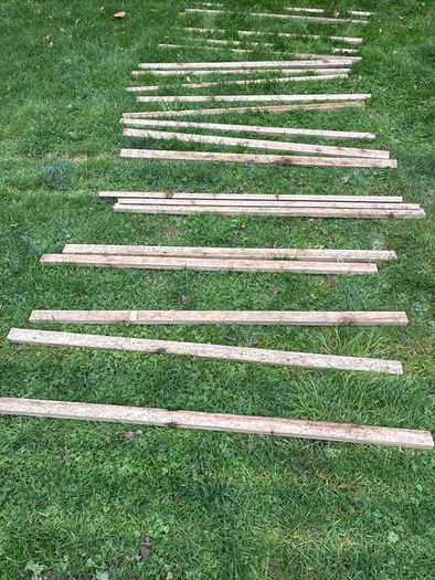 23 lengths of treated wood approx 1.3m long