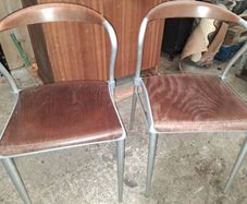 Pair of Piuma occasional chairs designed by Origlia
