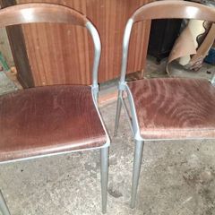 Pair of Piuma occasional chairs designed by Origlia