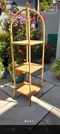 Vintage arched bamboo and rattan three-tier shelving unit
