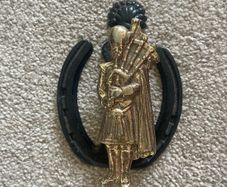Unique Brass Door Knocker featuring a Bagpiper