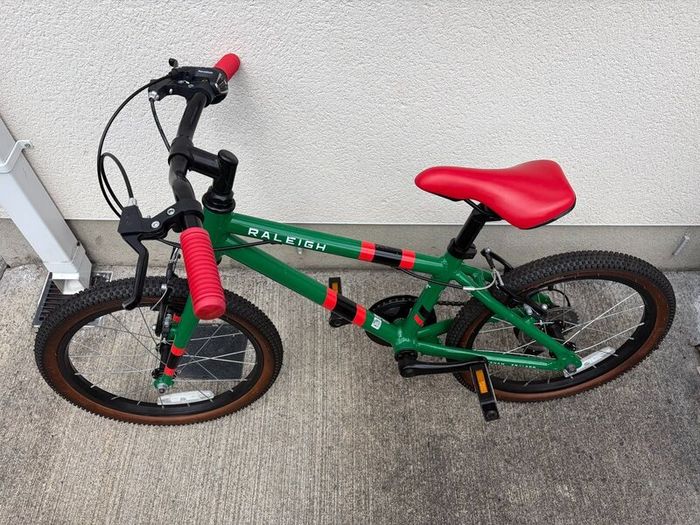 2 Kids Bikes: Raleigh Pop 18 & Carrera Cosmos 14"