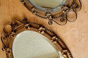 Antique brass pair of wrought iron mirrors