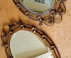 Antique brass pair of wrought iron mirrors