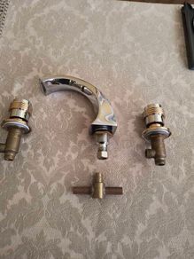 Chrome Bath Taps with Gold Trim.