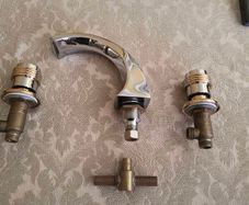 Chrome Bath Taps with Gold Trim.