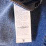 Mid-wash Distressed Jeans with Cuffed Hem. Image 9