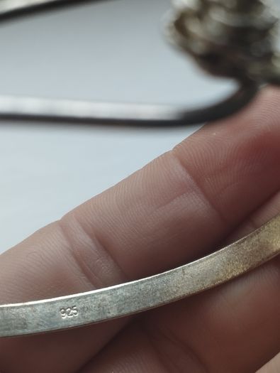 Vintage sterling silver bracelet with a rose-shaped clasp.