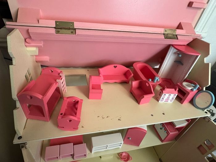 girl's doll house with pretend play furniture