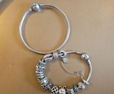 Genuine Pandora bundle: Snake chain bracelet with safety chain + solid Pandora bangle.