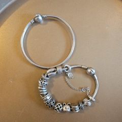 Genuine Pandora bundle: Snake chain bracelet with safety chain + solid Pandora bangle.