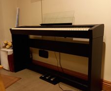 Roland electric  piano fp60 model in Black.