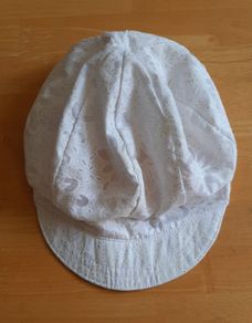 Very light white women's summer hat