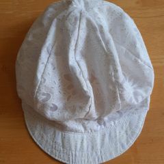 Very light white women's summer hat