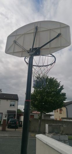 Basketball stand and two basketballs