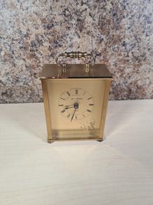 VINTAGE WM WIDDOP carraige clock gold tone with roman numerals mantel clock
