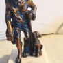 Bronze-style patina and mounted on a white marble basefigurine of the ancient Greek philosopher Diogenes of Sinope, often depicted with his lantern and a dog. Image 2