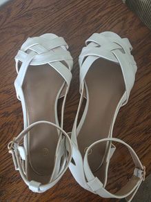 shoes - size 4, one white pair, one rose gold. Never worn.