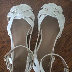 shoes - size 4, one white pair, one rose gold. Never worn.