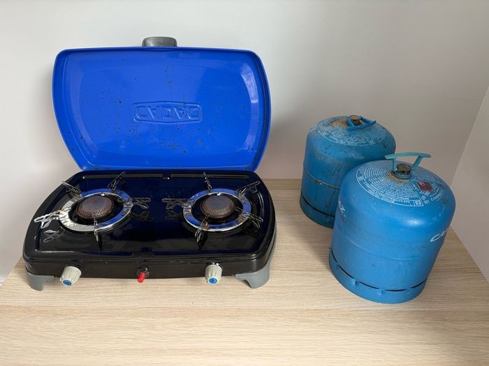 Camping gas cooker and gas bottles