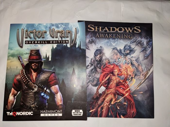 Gaming posters, manuals, DLC codes, art, post cards